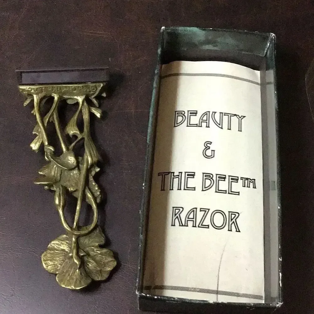 Vintage ornate, solid, brass, ladies, razor the beauty and the bee from C.A. Dan